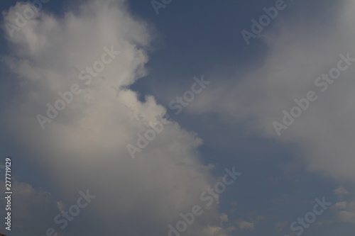 The vast blue sky and clouds sky. blue sky background with tiny clouds. 