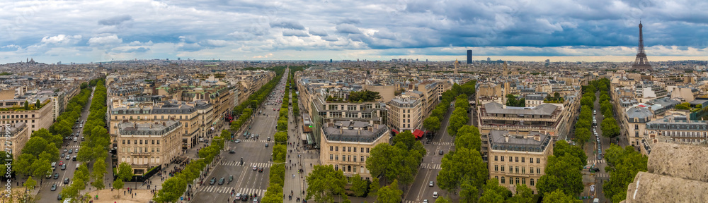 Huge aerial panorama picture of the Paris cityscape with Montmartre, Sacré-Cœur, Tour Montparnasse and Eiffel Tower including Avenue de Friedland, Av. des Champs-Élysées, Av. Marceau and Av. d'Iéna.