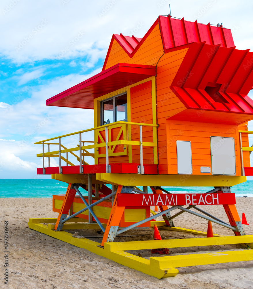 Colorful lifeguard tower under a cloudy sky in Miami Beach Colorful lifeguard tower under a cloudy sky in Miami Beach
