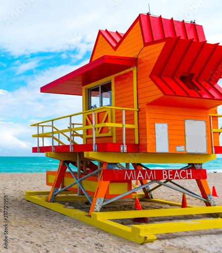 Colorful lifeguard tower under a cloudy sky in Miami Beach © Gabriele Maltinti