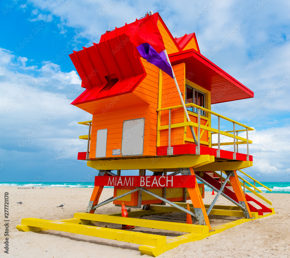 Orange, red and yellow lifeguard tower in Miami Beach Orange, red and yellow lifeguard tower in Miami Beach