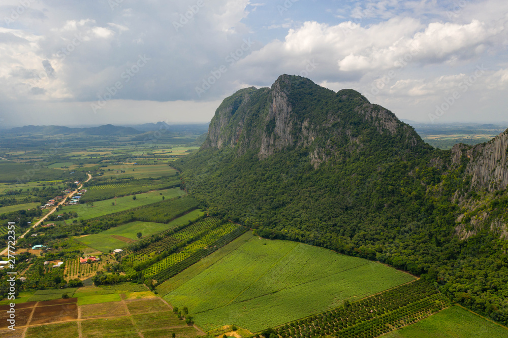 Fototapeta premium Aerial view. High mountain views and the verdant farmland of the countryside In Sa Kaeo, Thailand