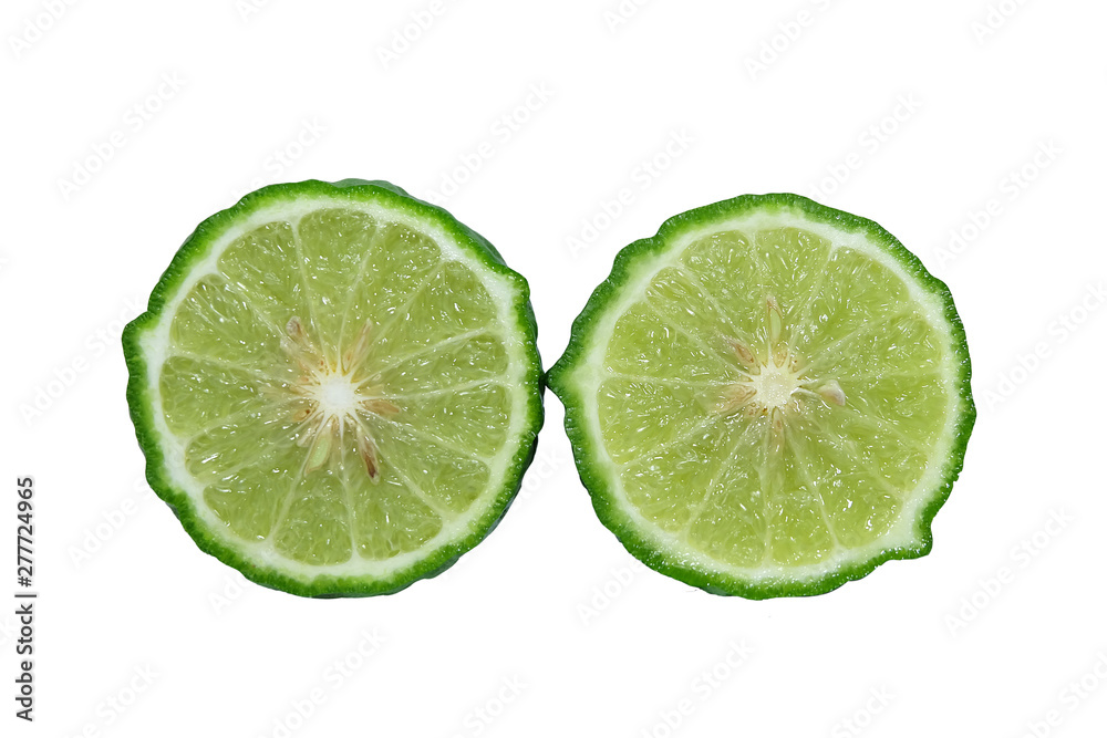 sliced half kaffir isolated on white background. Bergamot on white background. closeup sliced half kaffir lime or Bergamot. sliced half kaffir isolated on white background. Bergamot on white background. closeup sliced half kaffir lime or Bergamot.