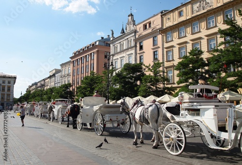 traditional cabs for tourists in Krakow's Market Square