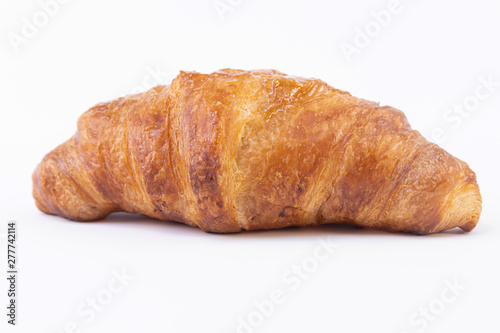 Tasty croissant with chocolate and jam isolated on white background