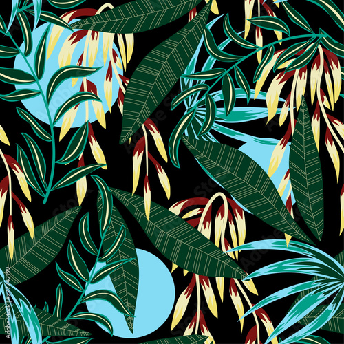 Trend seamless pattern with colorful tropical leaves and plants on a dark background. Vector design. Jungle print. Floral background. Printing and textiles. Exotic tropics. Fresh design.
