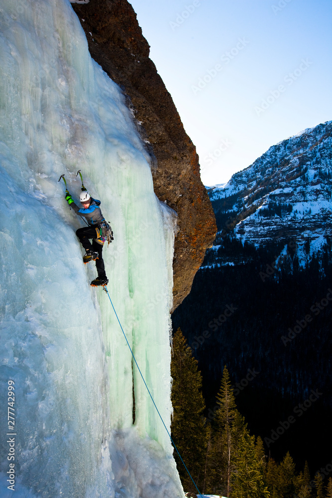 A man climbs Over Easy (WI3) in Hyalite Canyon in Montana. A man climbs Over Easy (WI3) in Hyalite Canyon in Montana.
