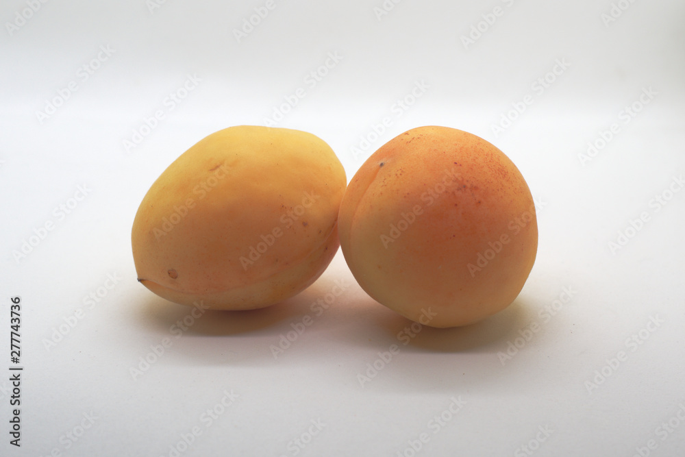 apricots on a white background apricots on a white background