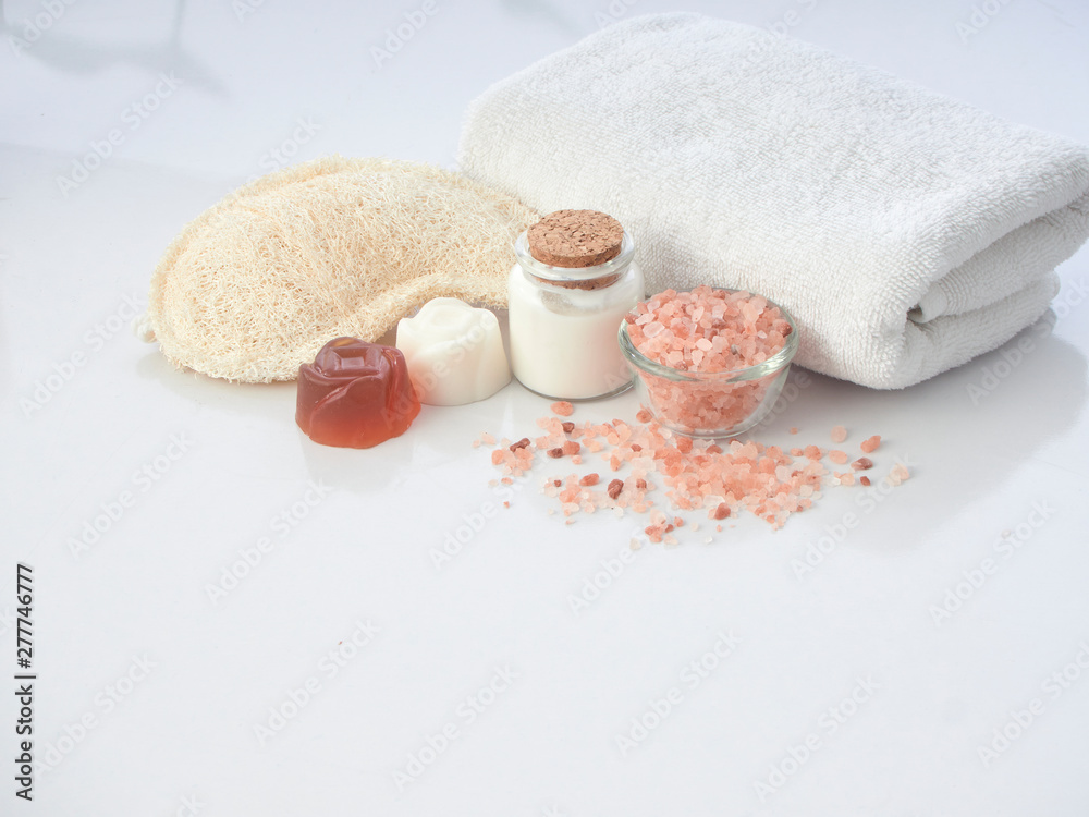 Set of spa accessories on a white table Set of spa accessories on a white table