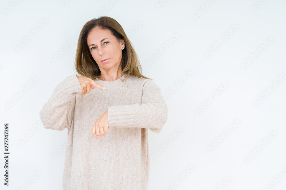 Beautiful middle age woman over isolated background In hurry pointing to watch time, impatience, upset and angry for deadline delay Beautiful middle age woman over isolated background In hurry pointing to watch time, impatience, upset and angry for deadline delay