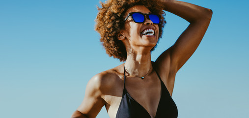Woman looking happy on summer vacation