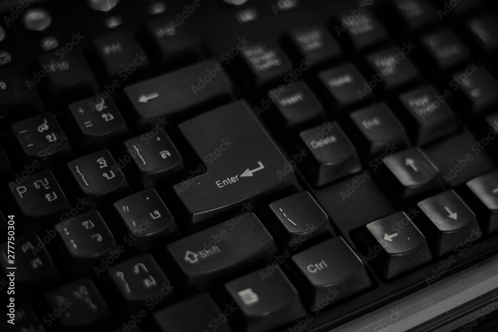 A keyboard or set of buttons for operating a portable electronic device, telephone, or other equipment on white background. Computer keyboard, Thai font A keyboard or set of buttons for operating a portable electronic device, telephone, or other equipment on white background. Computer keyboard, Thai font