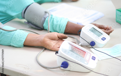 Blood pressure measurement. Blood pressure monitor. Heartbeat check. Blood pressure check.