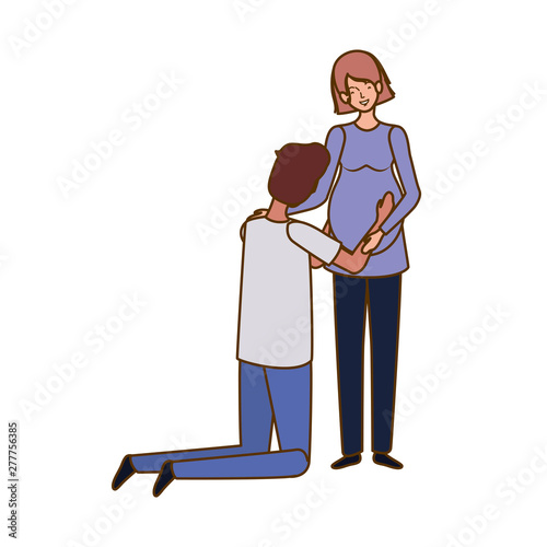 pregnant woman with husband standing