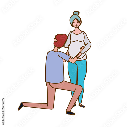 pregnant woman with husband standing