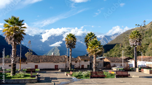 The main square of Cachora village with snow Andes mountains on the background, Peru © nomadkate
