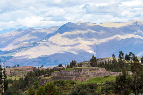 Green mountain landscape with Inca ruins of fortress Puka Pukara, Cusco Region, Peru © nomadkate