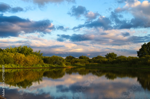 landscape with lake and blue sky