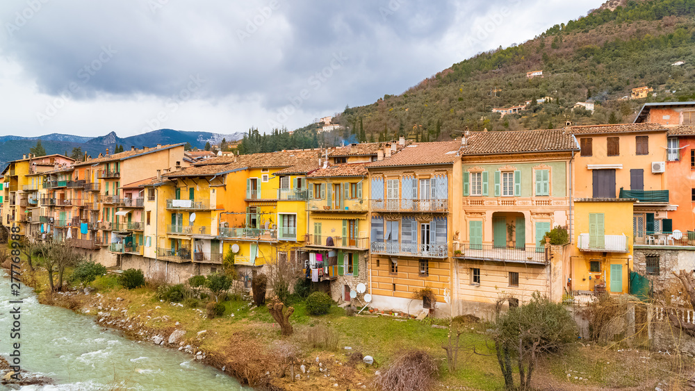     Sospel, old french village near the river, typical colorful houses