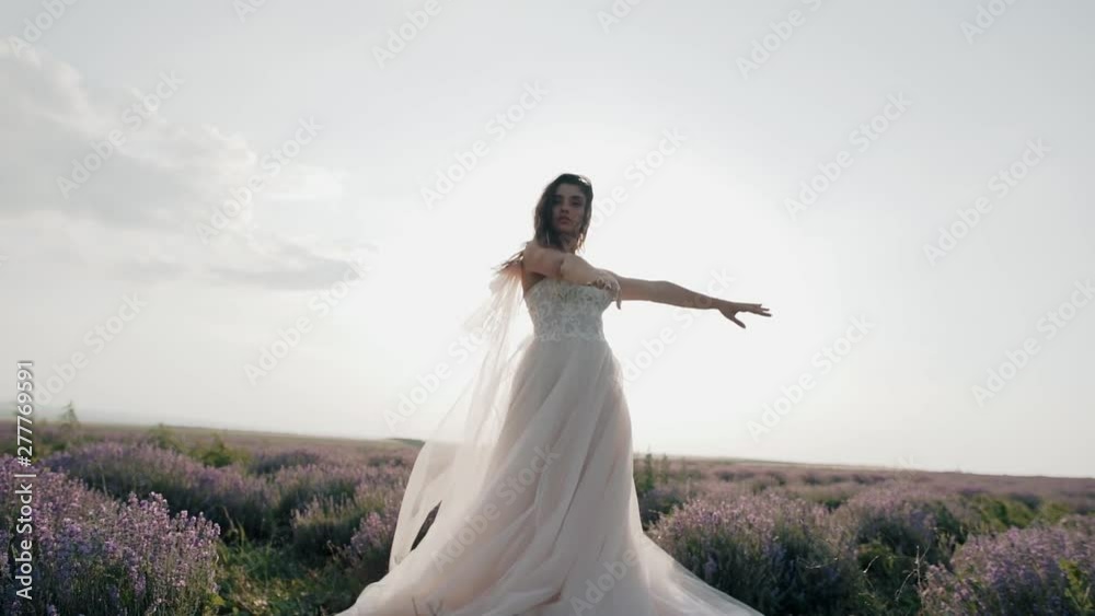 Portrait of bride in a wreath of lavender in the rays of the sunset sun Portrait of bride in a wreath of lavender in the rays of the sunset sun