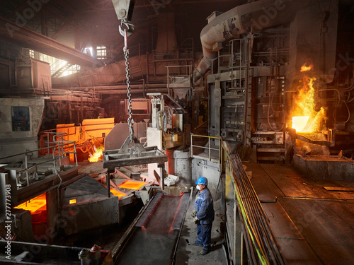 Industry, Smeltery, worker using indoor crane photo