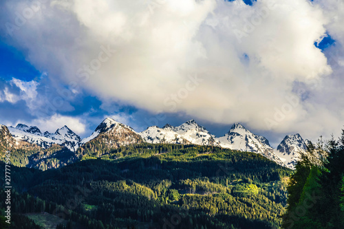 Italy, Trentino-Alto Adige, Predazzo, snowcapped Dolomites mountains photo