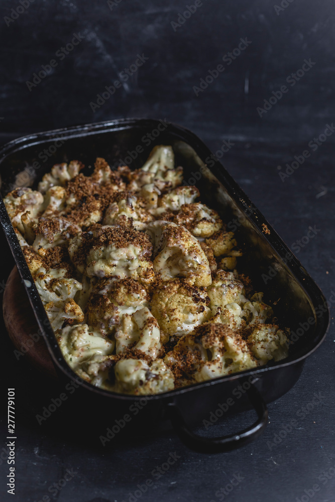 Casserole of baked cauliflower florets with Hollandaise and breadcrumbs Casserole of baked cauliflower florets with Hollandaise and breadcrumbs