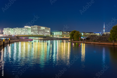 Germany, Berlin, view to lighted modern buildings near Spree River photo