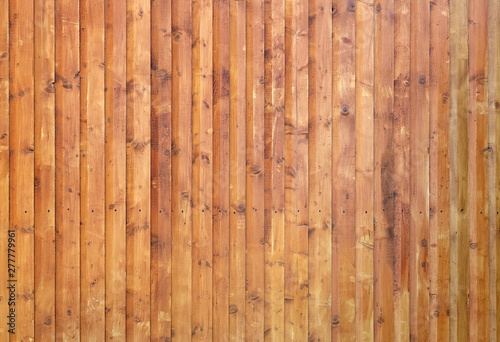 Wooden wall assembled of boards