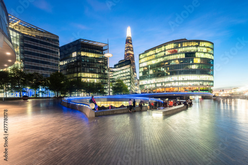 UK, London, modern office buildings at dusk photo