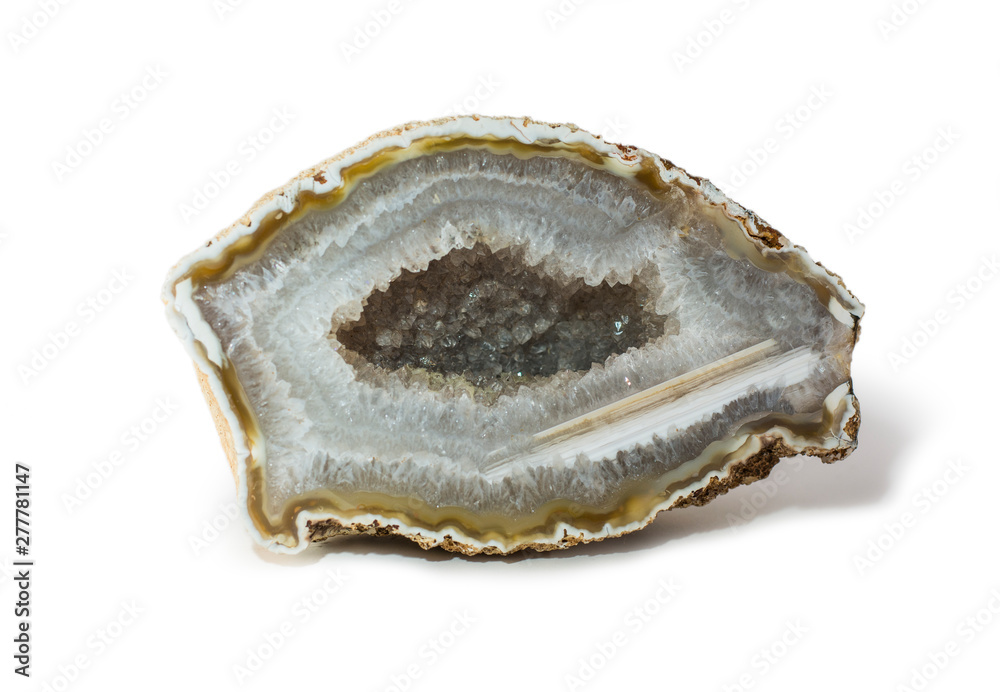 An agate stone placed on the white background. Horizontal studio shot. An agate stone placed on the white background. Horizontal studio shot.