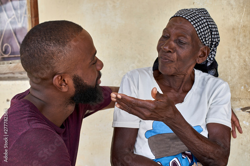 Mozambique, Maputo, portrait of grandmother with grandson photo