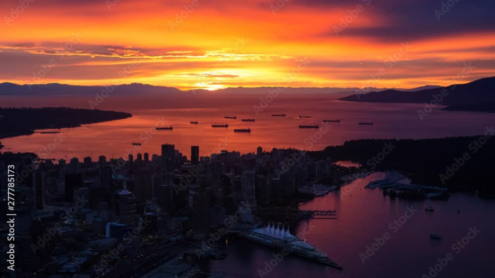 Aerial view of Downtown Vancouver, British Columbia, Canada. Taken during a vibrant and colorful sunset. Still Image Continuous Animation Aerial view of Downtown Vancouver, British Columbia, Canada. Taken during a vibrant and colorful sunset. Still Image Continuous Animation