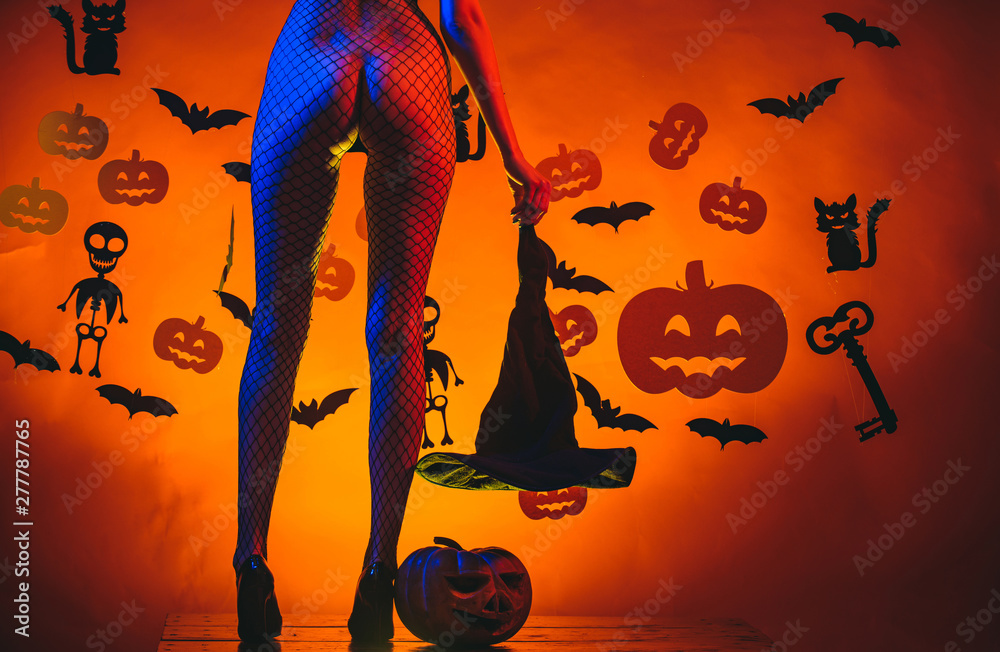 Female with sexy ass posing on pumpkin. Sexy buttocks. Halloween poster  with pumpkins. Secrets of Magic for Happy Halloween. Sexy girl have Best  ideas for Halloween. Stock Photo | Adobe Stock