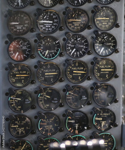 Details with the dials in the cockpit of a military cargo airplane. © MoiraM