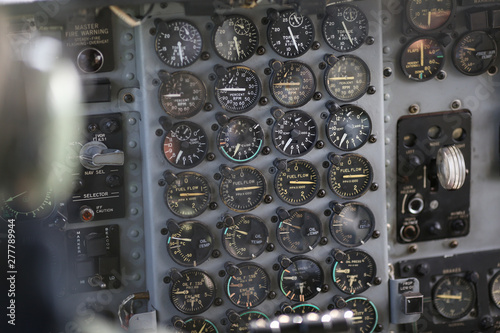 Details with the dials in the cockpit of a military cargo airplane. photo
