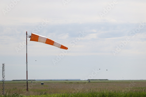 Details with a wind direction indicator on an airport