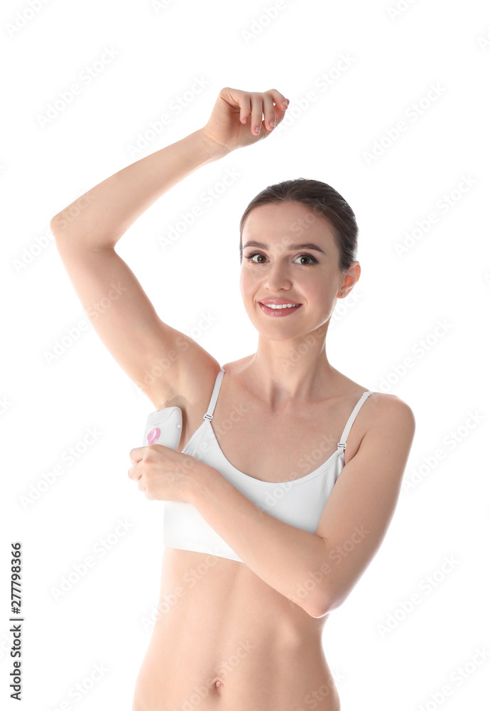 Smiling young woman doing armpit epilation procedure on white background Smiling young woman doing armpit epilation procedure on white background