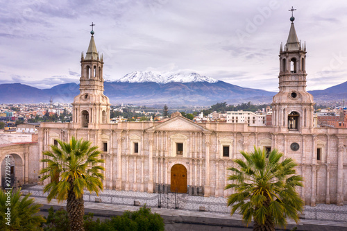 Aerial drone view of Arequipa main square and cathedral church, with the Misti volcano as background.