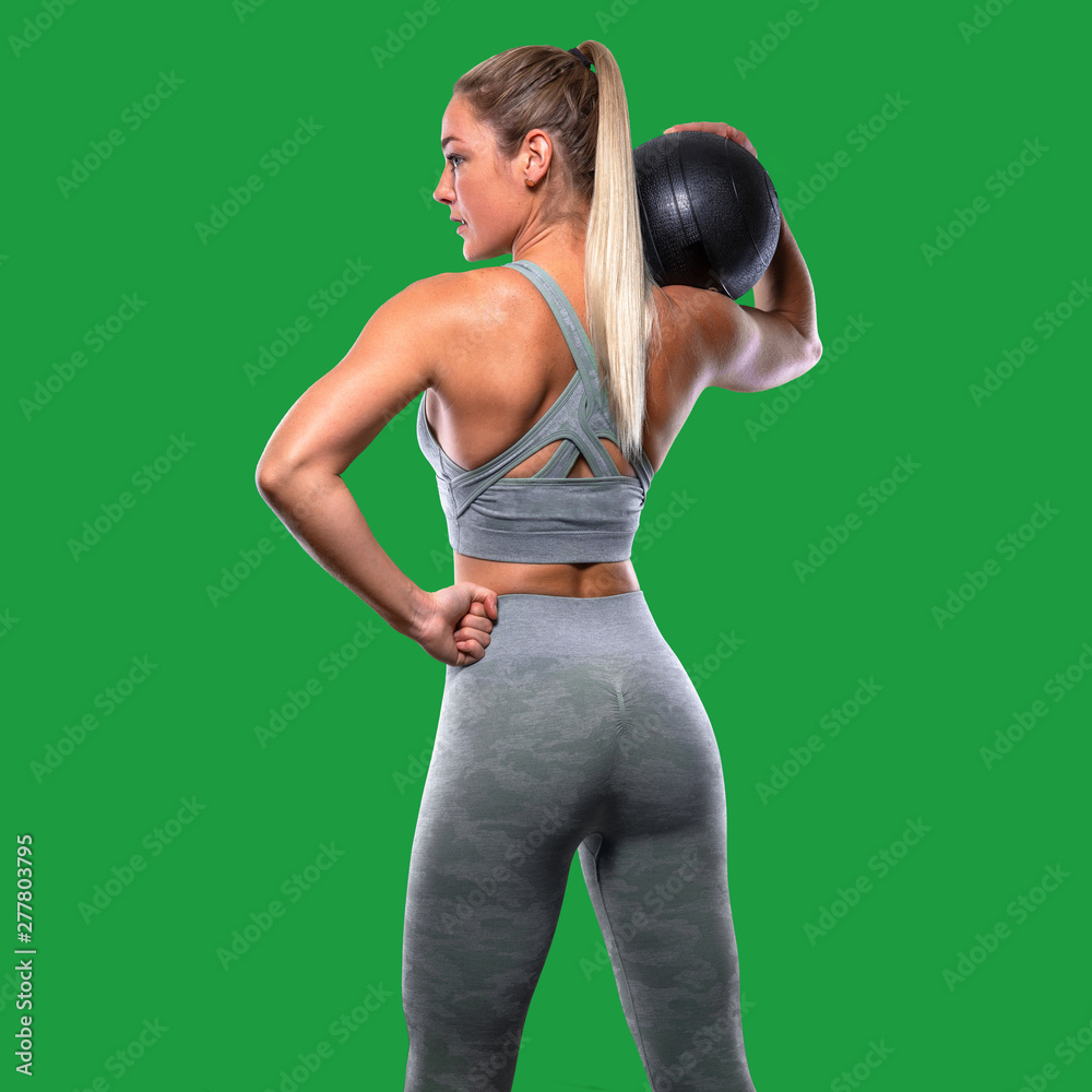 Foto de Strong confident power stance, female trainer with
