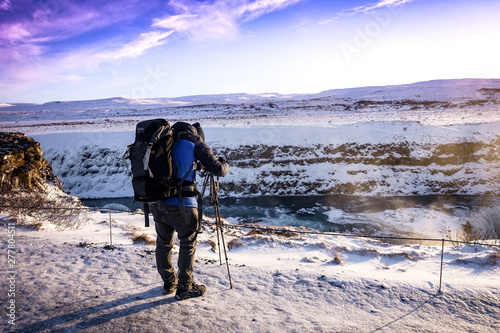 Landscape Photographer Overlooking Frozen River Cliff Iceland