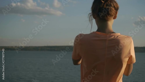 Woman taking selfie on her phone in beautiful nature. Travel vacation. photo