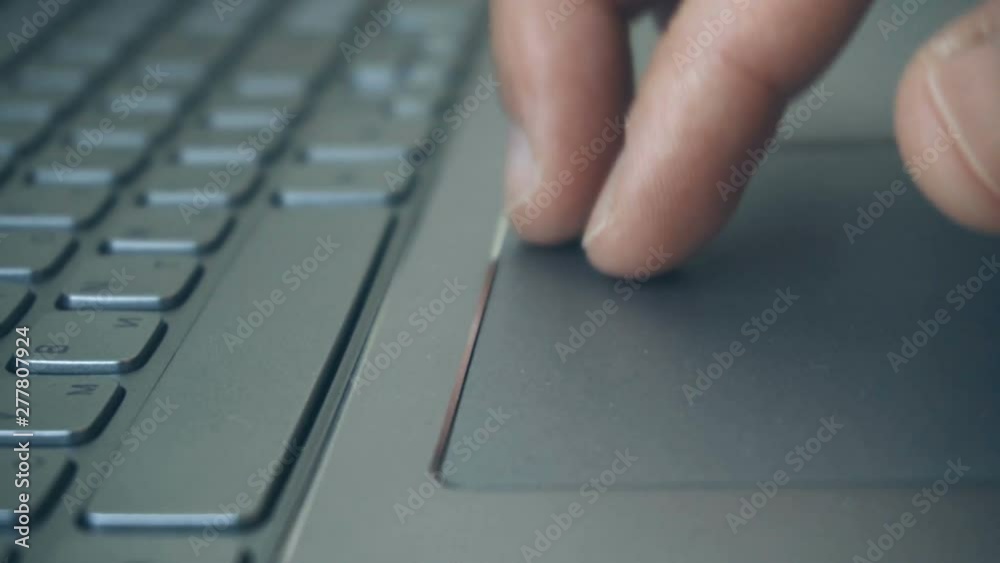 Extreme close-up of human hands on keyboard Extreme close-up of human hands on keyboard