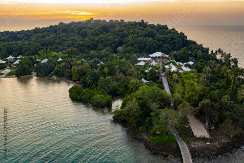 Drone shot the Luxury but Eco Community resort and hotel on the mountain in KohKood Island at the East of Thailand.
