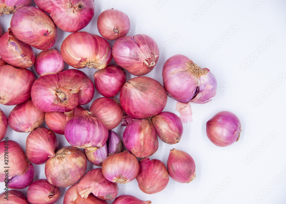 Red Onion. Shallot on white background with copy space