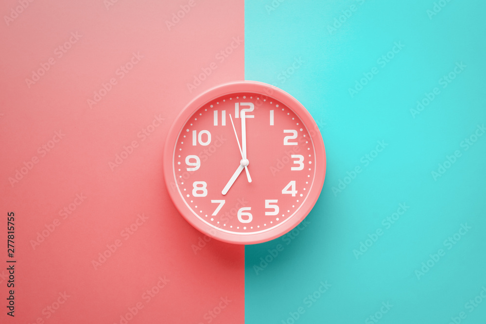 Top view red clock alarm clock not colored background divided