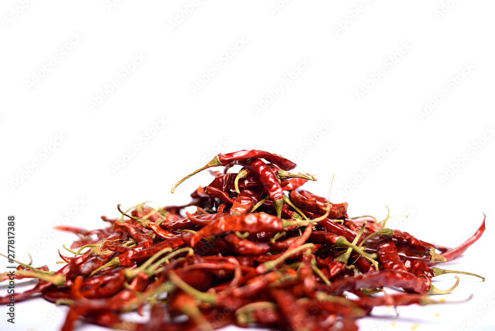 Fototapeta premium stack of red chili peppers isolated on white background