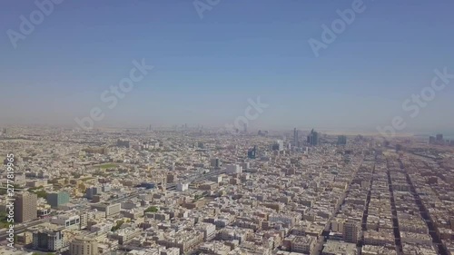 Vertical decent with view of Khobar skyline with suweiket and Khobar shamaliya and Khobar Dammam highway (4K) photo