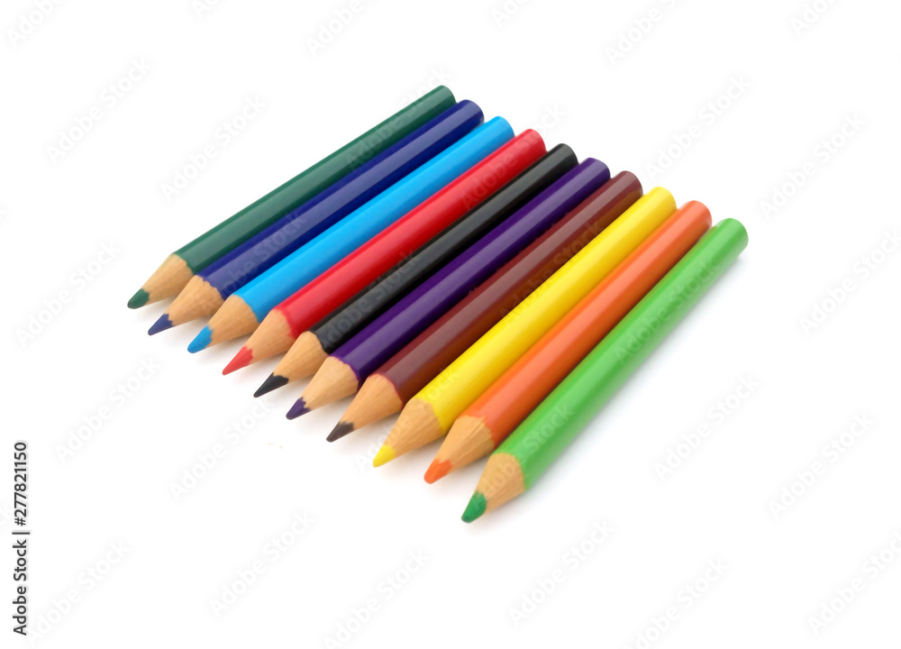 many different colored pencils on a white background. many different colored pencils on a white background.