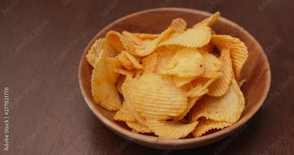 Having potato chip at party